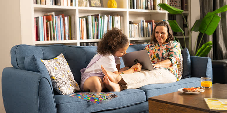 Mum and daughter on couch