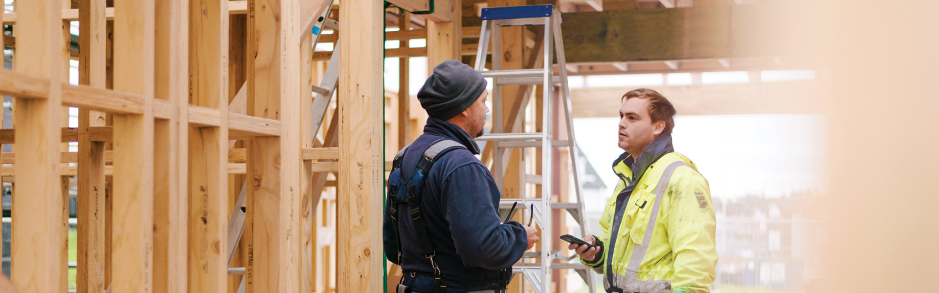 Builders in conversation on a building site