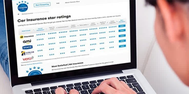 Laptop screen on woman's lap: Car insurance star ratings