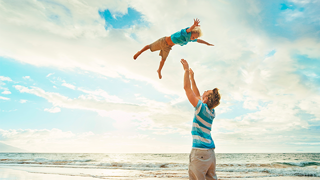 Man playing with child.