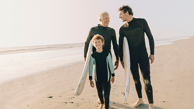 Three generations surfing.