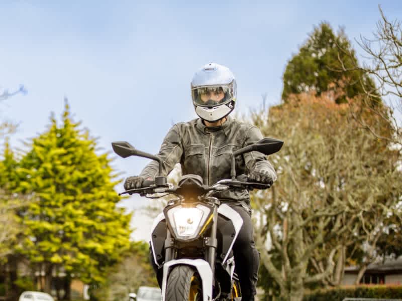 Person riding their motorcyle.