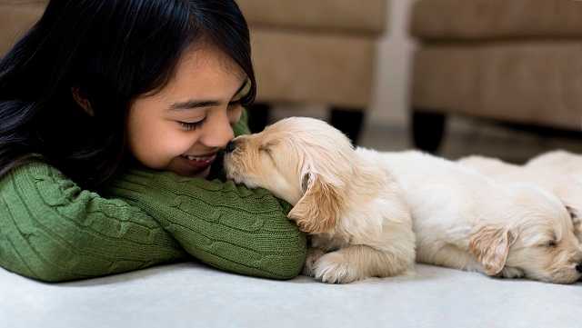 Girl with puppy